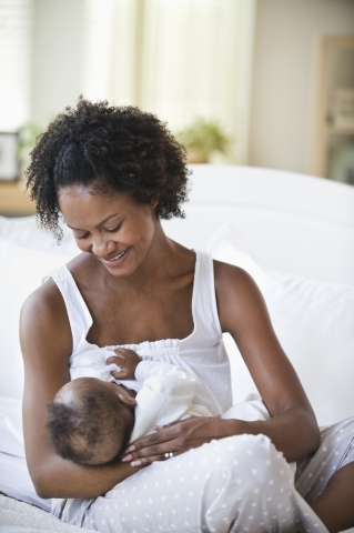Black woman breastfeeding